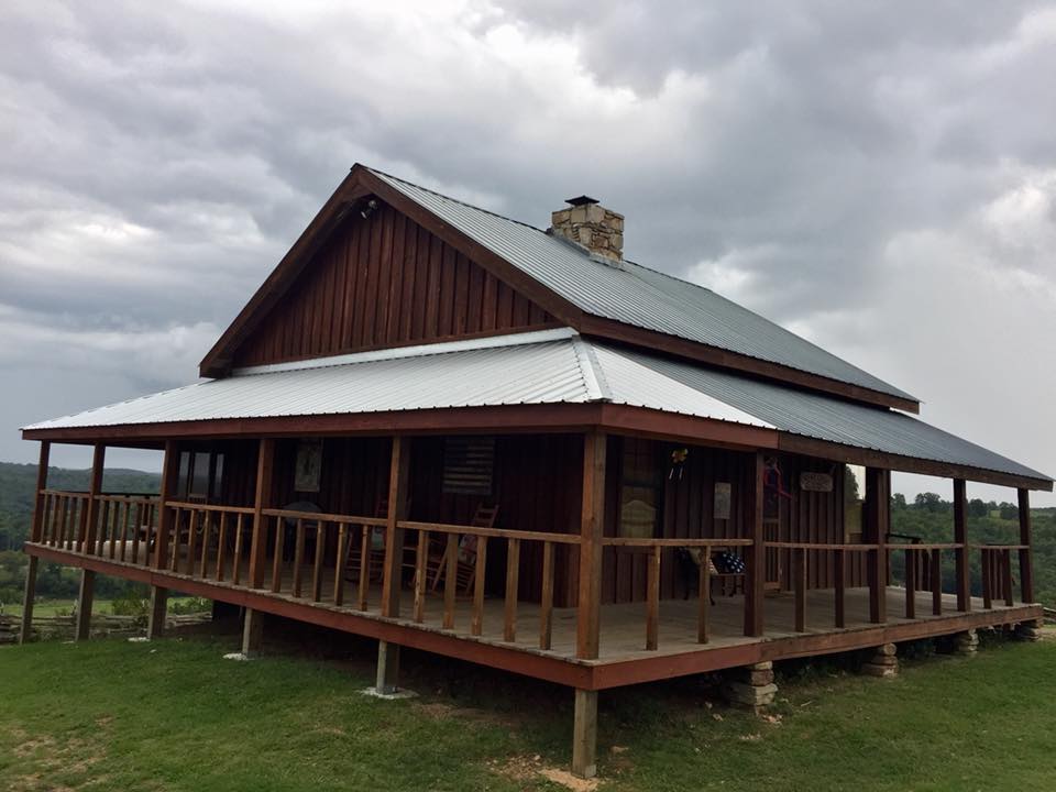 Shady screened porch for outdoor vacation relaxation at your next reunion or group retreat.