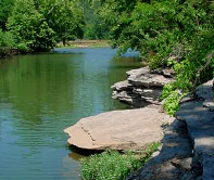 The best Arkansas family vacations include fishing for small mouth bass near  the Buffalo River.